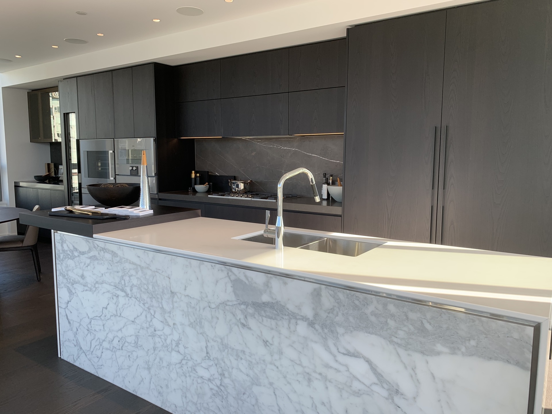 Tesoro kitchen with marble slab kitchen island at 1601 Quebec, False Creek, Vancouver West Tesoro kitchen with marble slab kitchen island at 1601 Quebec, False Creek, Vancouver West