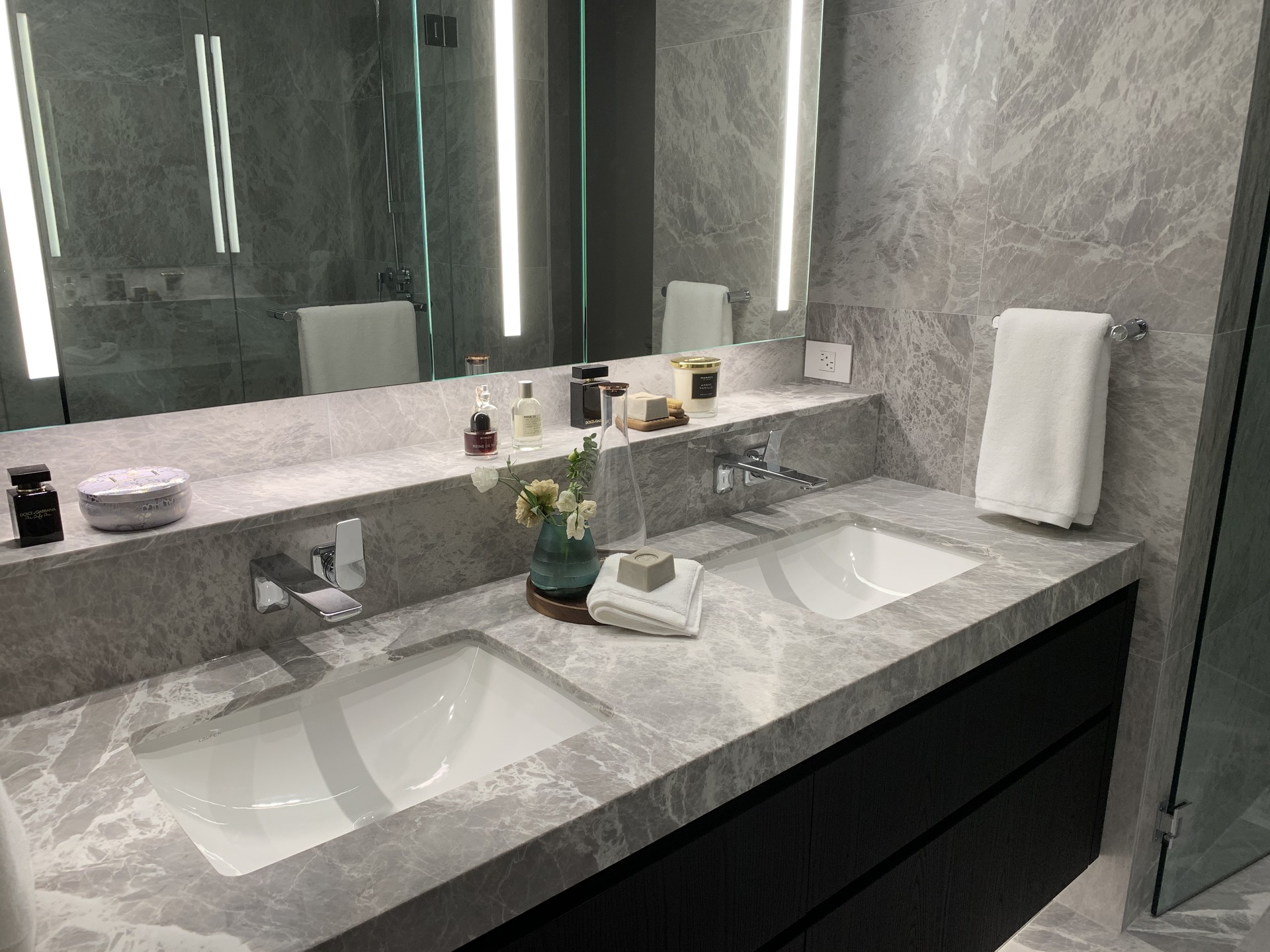 Tesoro ensuite double sinks with marble slab countertop at 1601 Quebec, False Creek, Vancouver West Tesoro ensuite double sinks with marble slab countertop at 1601 Quebec, False Creek, Vancouver West