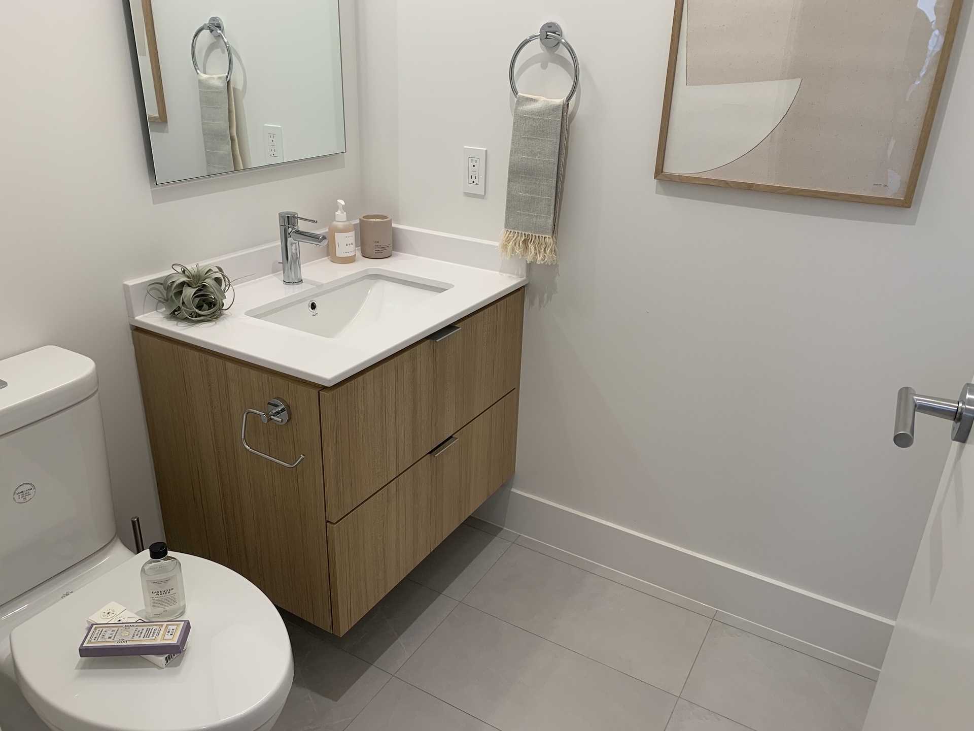 Kin - powder room on living level of City Home at 7470 Buller Avenue, Metrotown, Burnaby South Kin - powder room on living level of City Home at 7470 Buller Avenue, Metrotown, Burnaby South