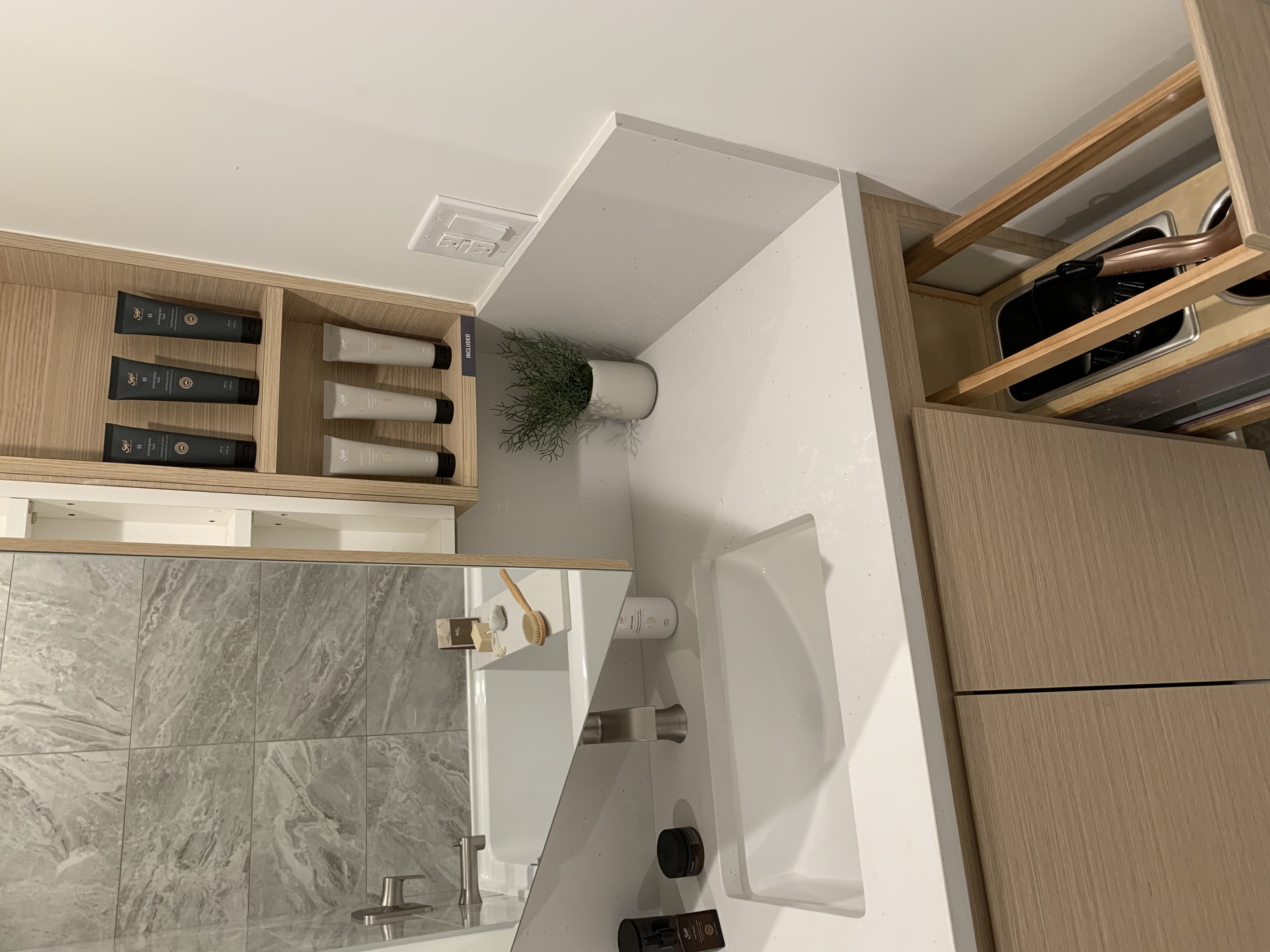 alaska-well-designed-bathroom-with-medicine-cabinet-open-shelving-and-hair-dryer-cupboard at 4455 Alaska Street, Brentwood Park, Burnaby North alaska-well-designed-bathroom-with-medicine-cabinet-open-shelving-and-hair-dryer-cupboard at 4455 Alaska Street, Brentwood Park, Burnaby North