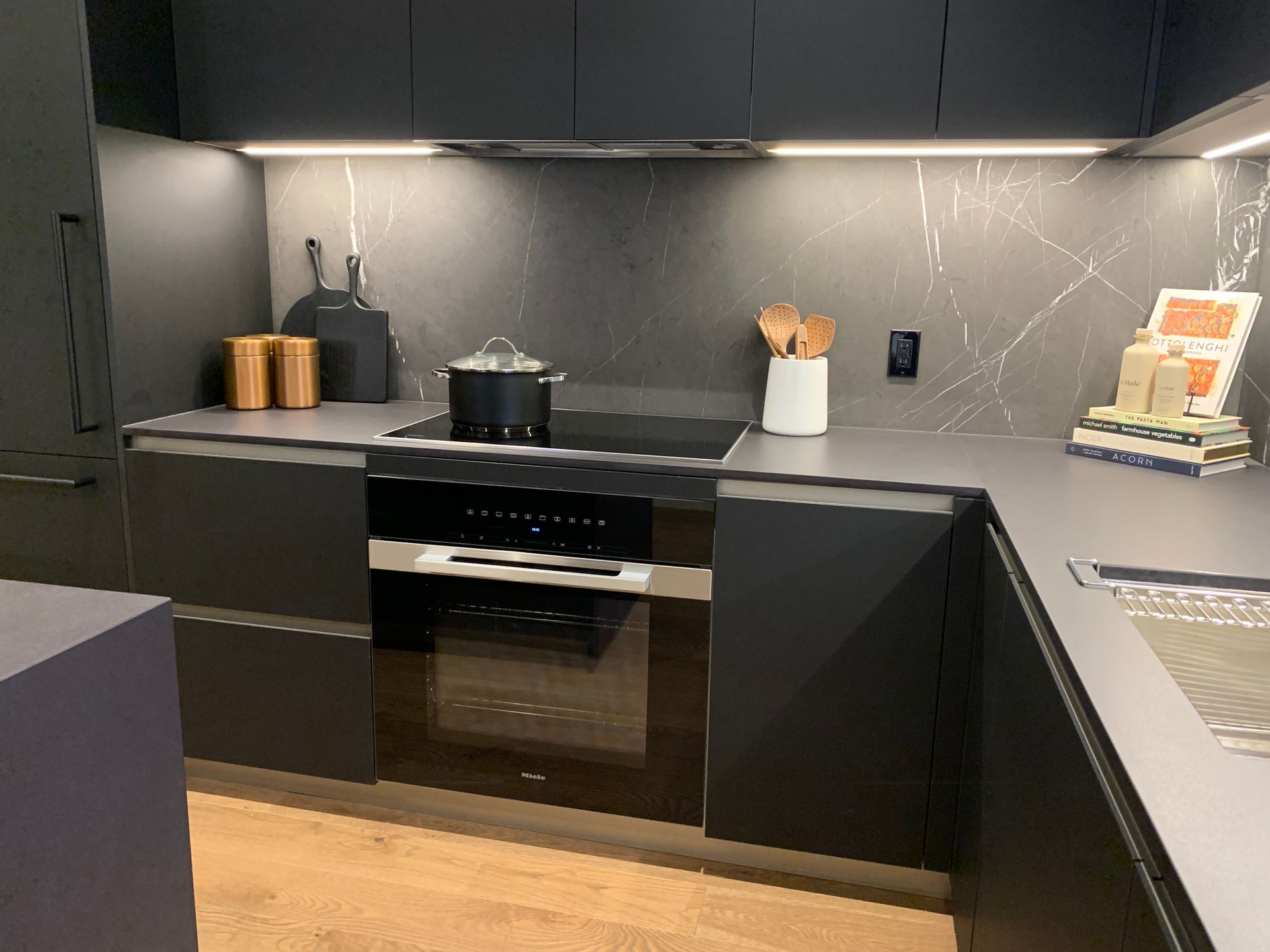 w16 display kitchen in dark colour scheme at 3220 Cambie Street, Cambie, Vancouver West w16 display kitchen in dark colour scheme at 3220 Cambie Street, Cambie, Vancouver West