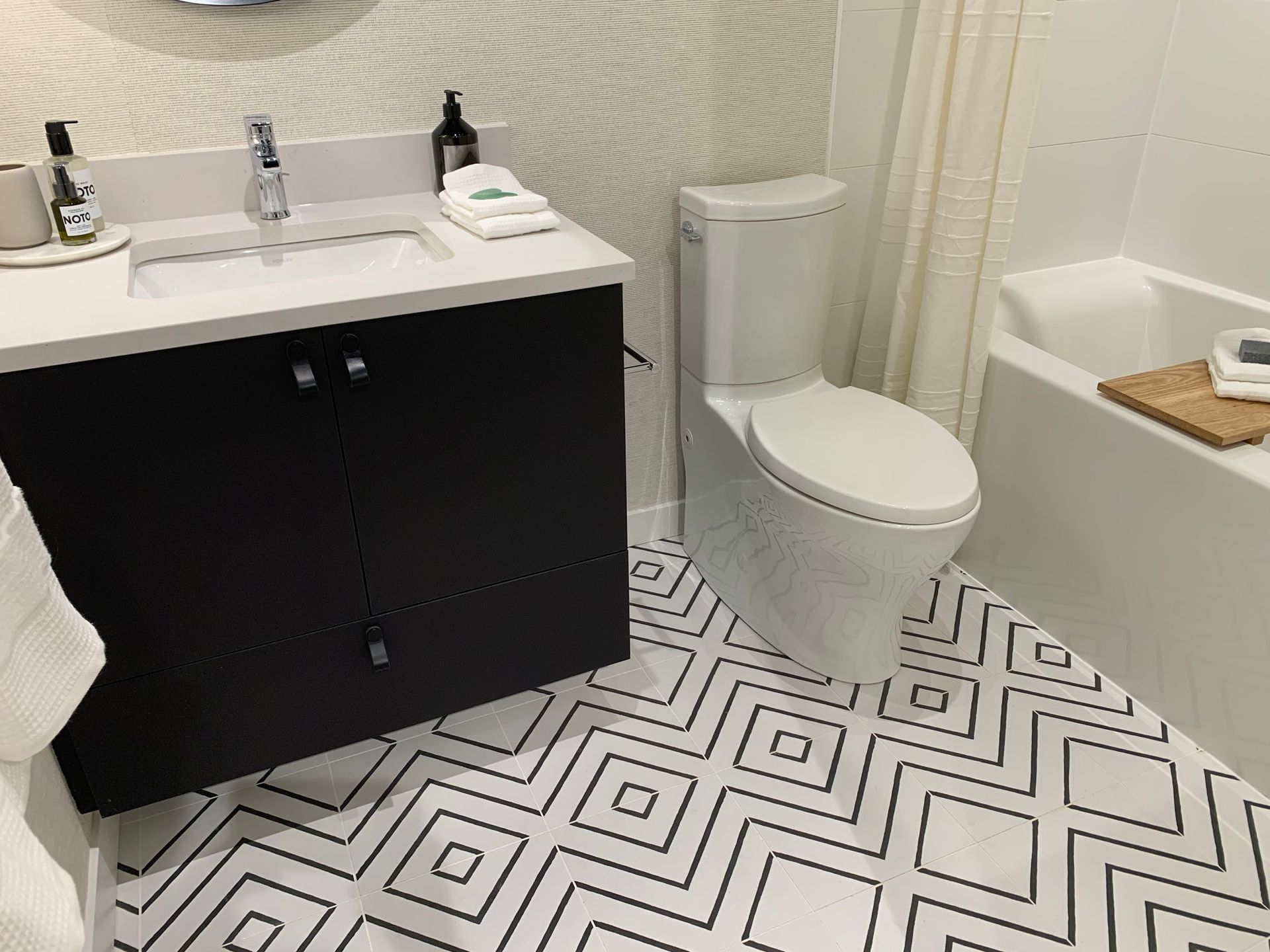 Main bathroom in Coffee at 1680 E 12th Avenue, Grandview Woodland, Vancouver East Main bathroom in Coffee at 1680 E 12th Avenue, Grandview Woodland, Vancouver East