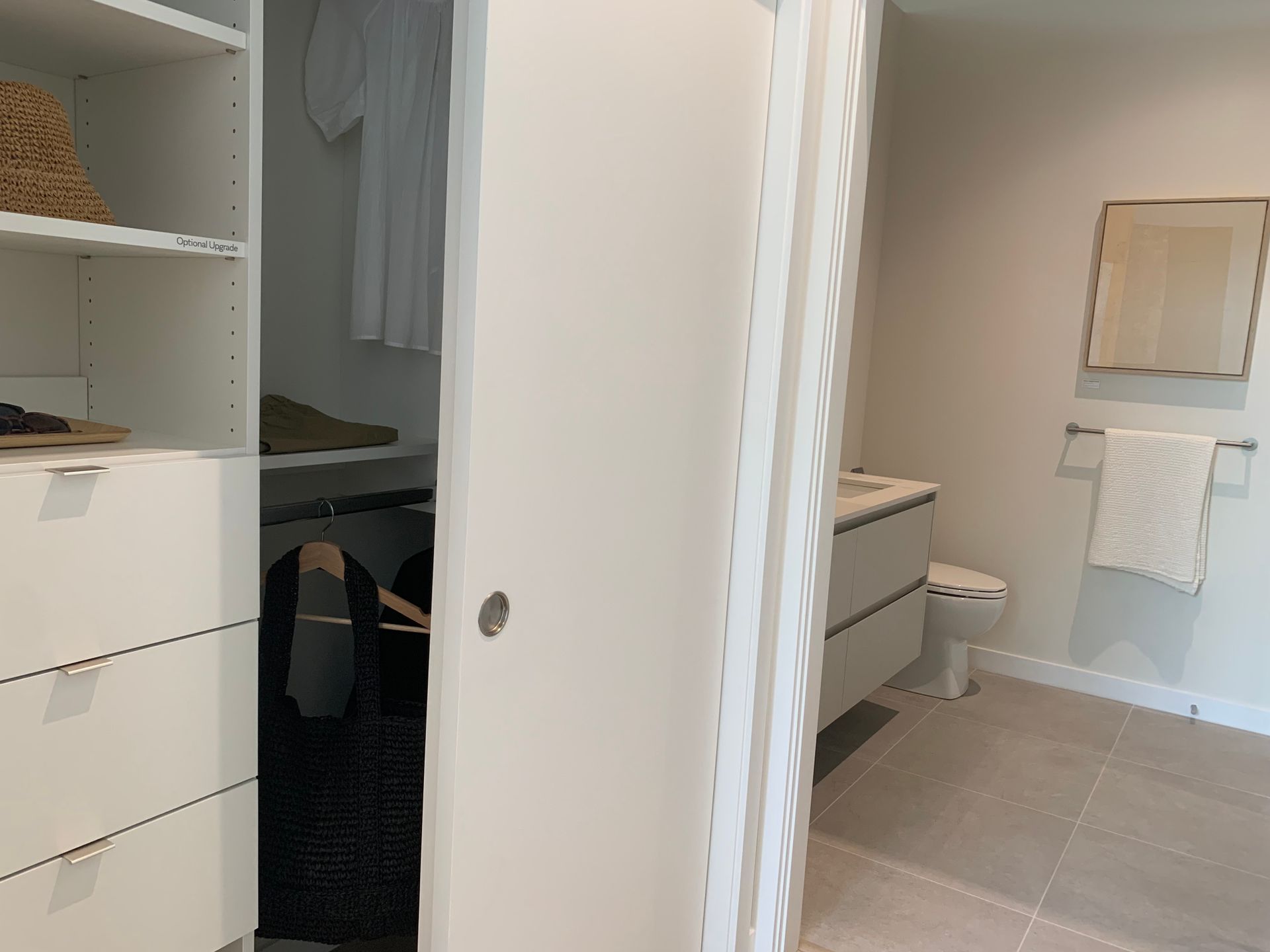 Soenhaus - wall through closet with upgraded shelving at 710 Como Lake Avenue, Coquitlam West, Coquitlam Soenhaus - wall through closet with upgraded shelving at 710 Como Lake Avenue, Coquitlam West, Coquitlam