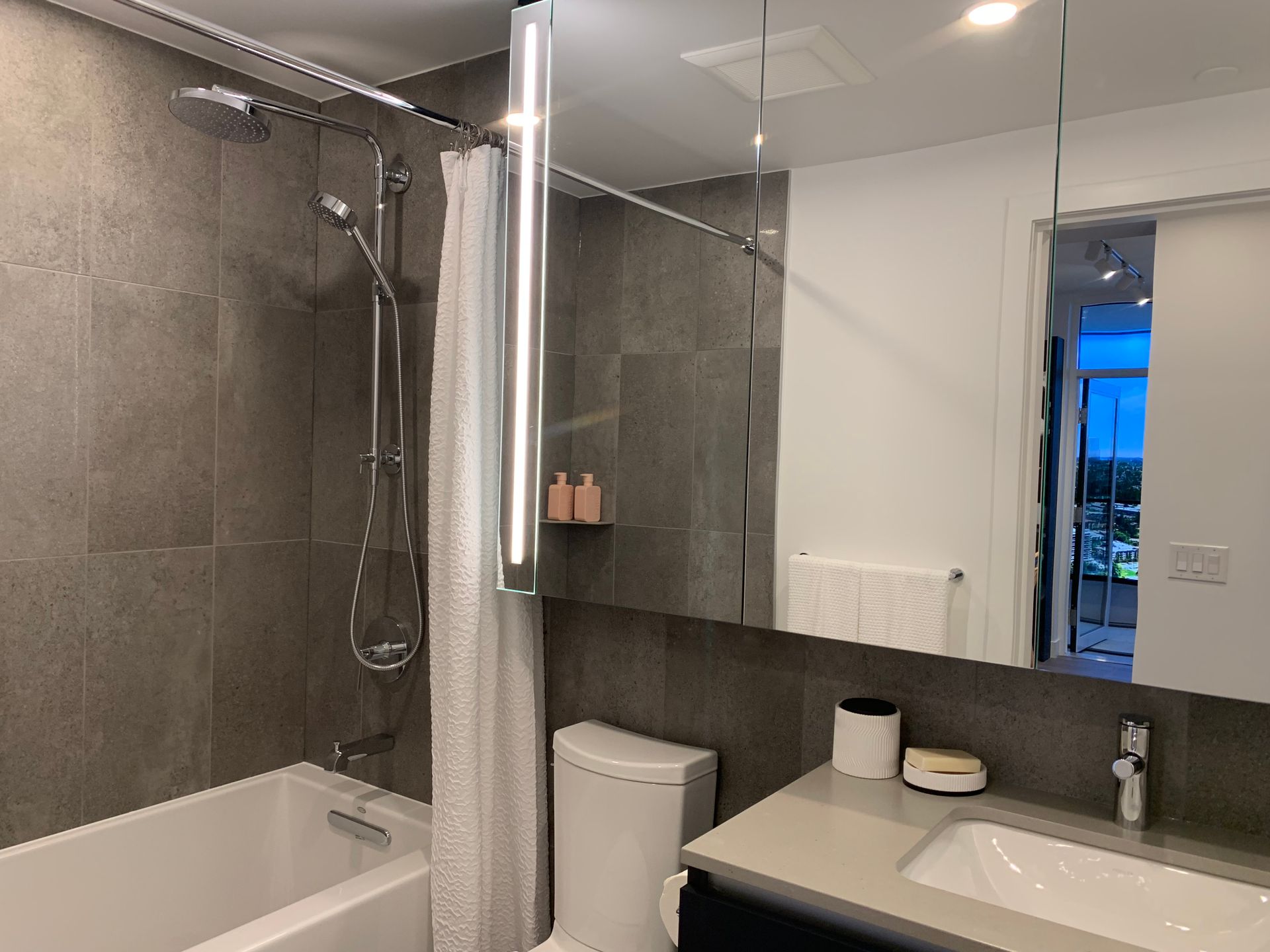 Intersect bathrm display in navy blue scheme at 10460 City Parkway, Surrey Central (Central City), North Surrey Intersect bathrm display in navy blue scheme at 10460 City Parkway, Surrey Central (Central City), North Surrey