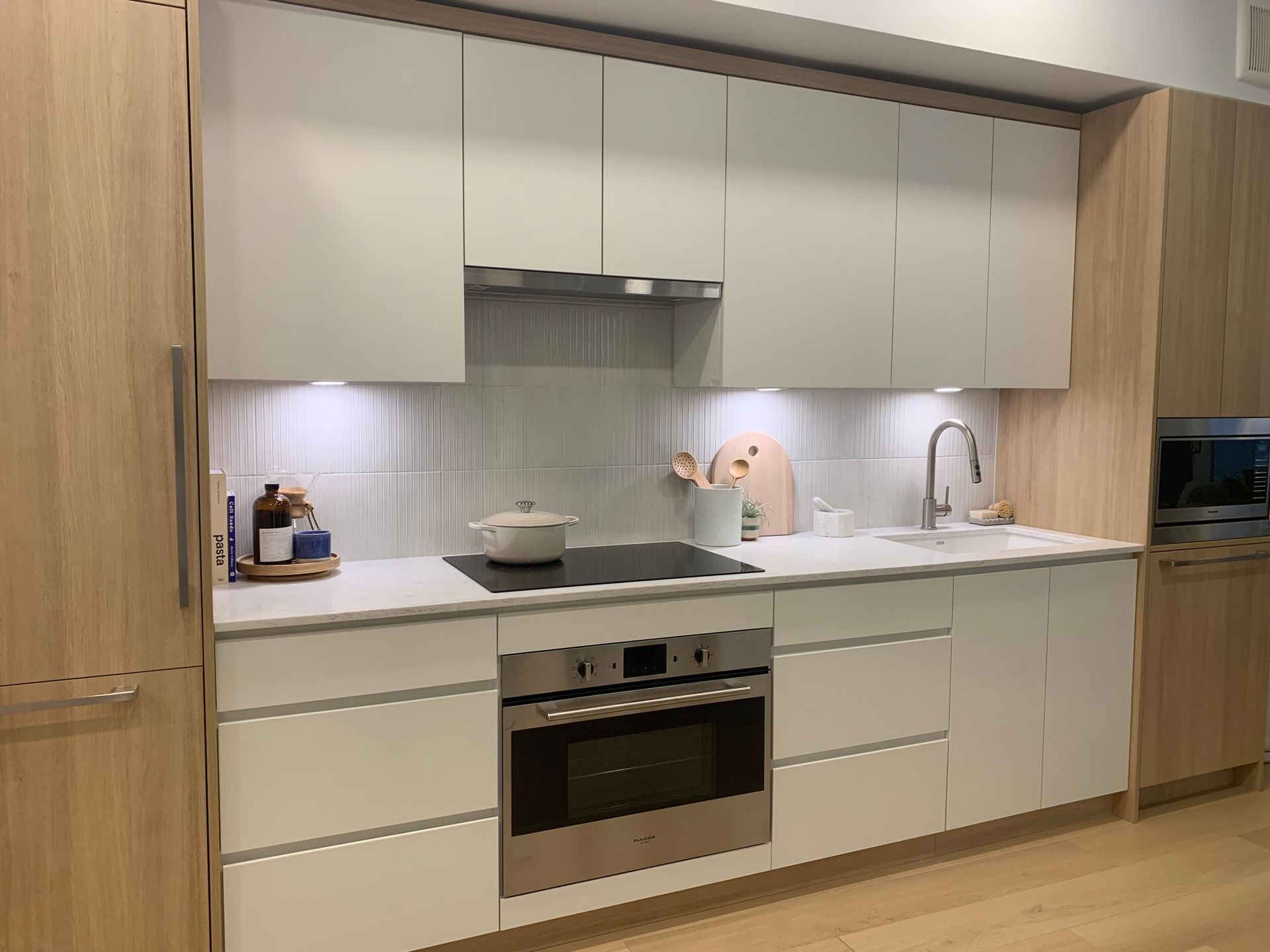 East Junction display kitchen in light scheme at 2465 Semlin Drive, Grandview Woodland, Vancouver East East Junction display kitchen in light scheme at 2465 Semlin Drive, Grandview Woodland, Vancouver East