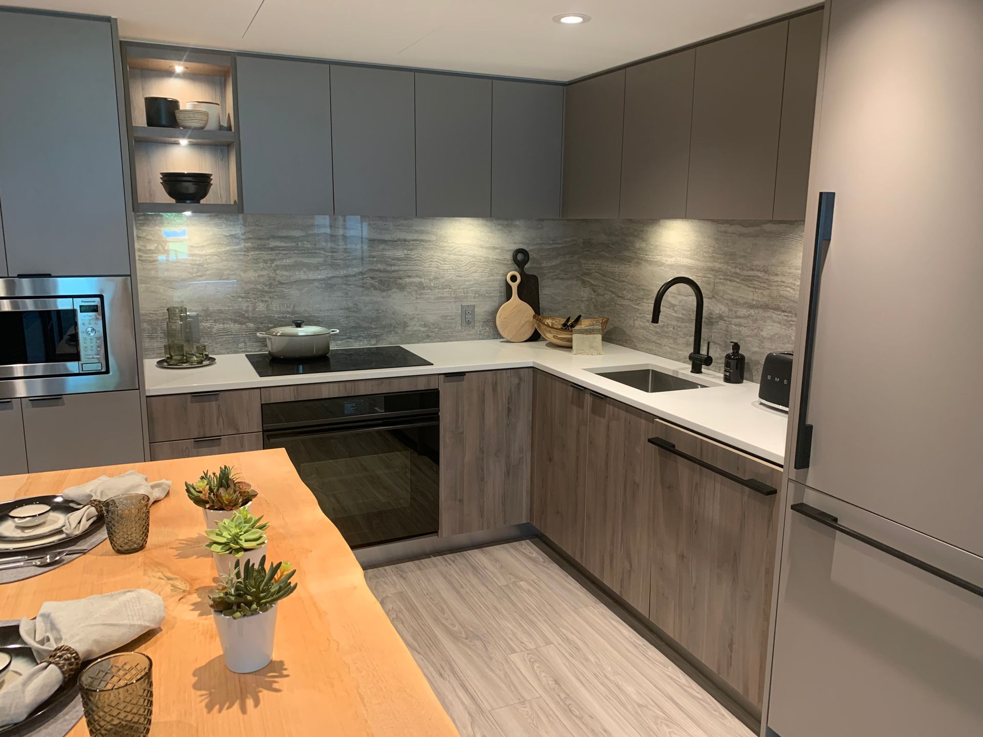 drift kitchen in dark scheme at  Harbourside Drive, Hamilton, North Vancouver drift kitchen in dark scheme at  Harbourside Drive, Hamilton, North Vancouver