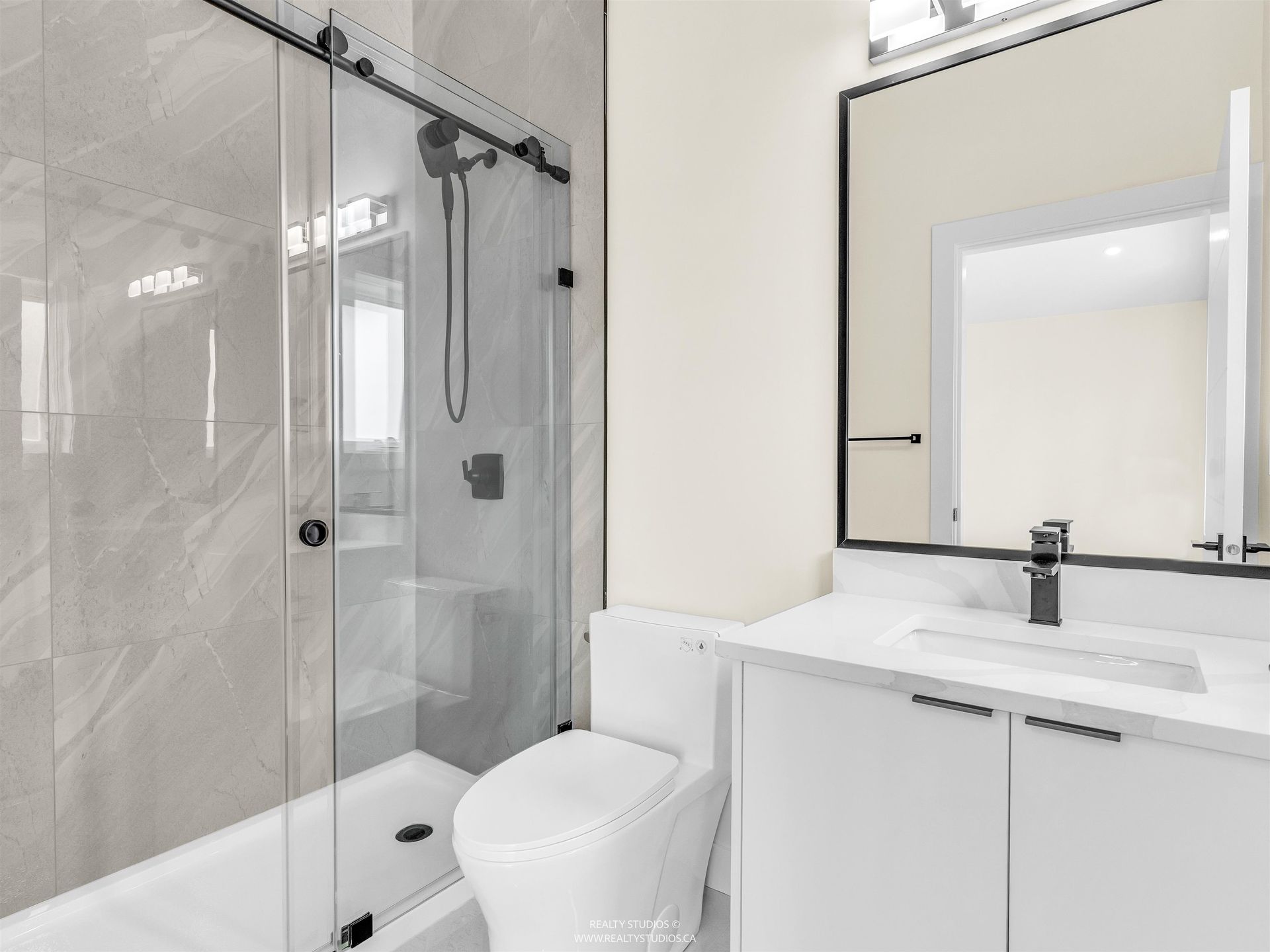 Ensuite with walk-in shower at 1 - 5221 Clarendon Street, Collingwood VE, Vancouver East Ensuite with walk-in shower at 1 - 5221 Clarendon Street, Collingwood VE, Vancouver East