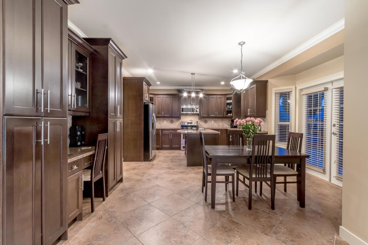 Kitchen & Eating Area at 7015 - 149 Street Surrey Bc