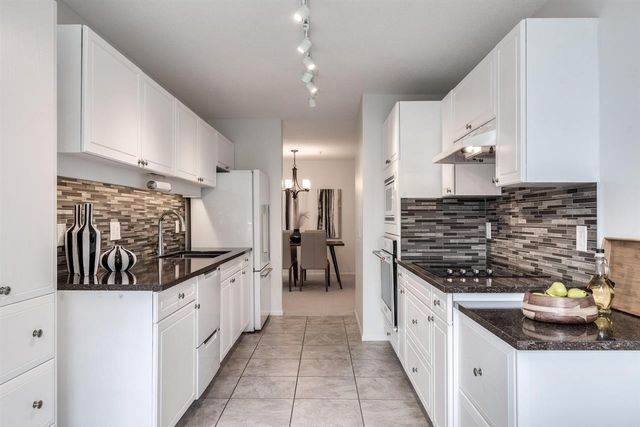 79180 at 402 - 3680 Banff Court, North Vancouver