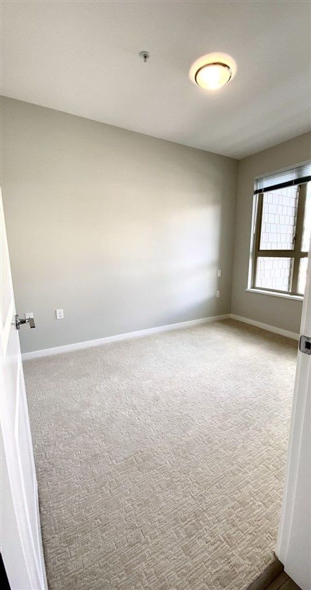 90014 at 402 - 2663 Library Lane, North Vancouver