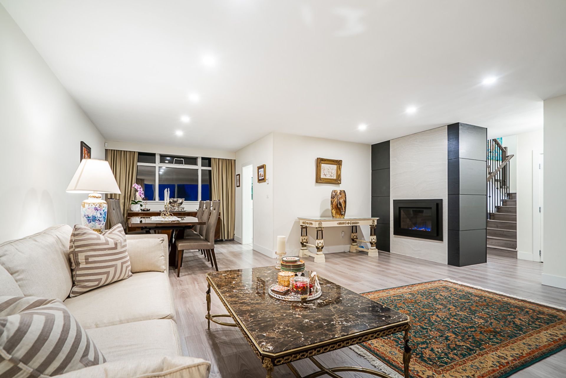 Ocean-View Living Room with Soaring Ceilings in West Vancouver at 1555 Lawson Avenue, Ambleside, West Vancouver