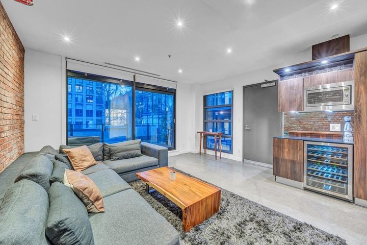 High-Ceiling Living Area in Heritage Vancouver Condo at 305 - 12 Water Street, Downtown VW, Vancouver West