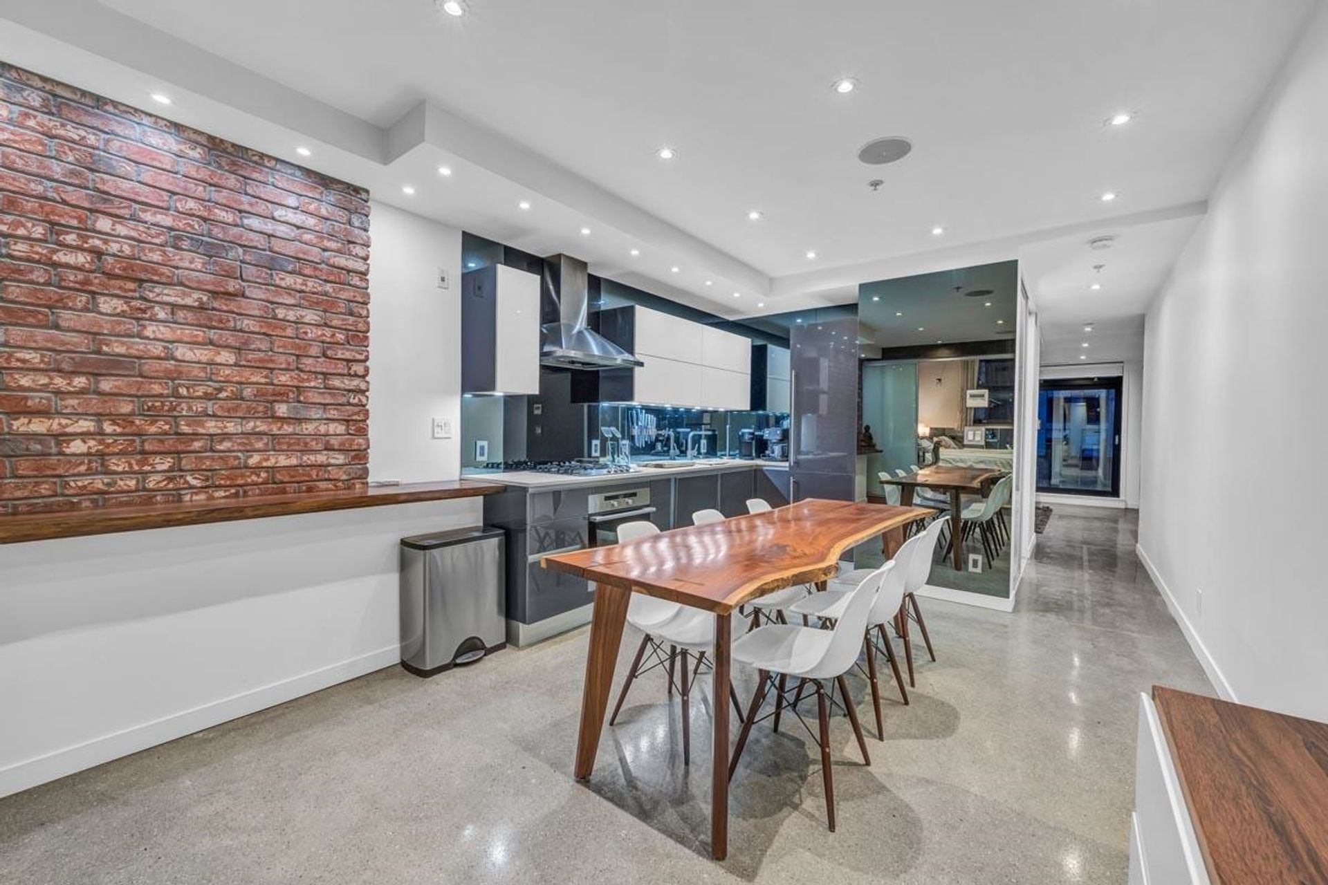 Brick-and-Beam Loft with Stylish Kitchen and Island at 305 - 12 Water Street, Downtown VW, Vancouver West