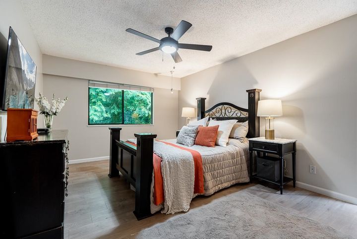 Primary bedroom at 1184 Riverside Drive with forest and nature views at 1184 Riverside Drive, Seymour NV, North Vancouver