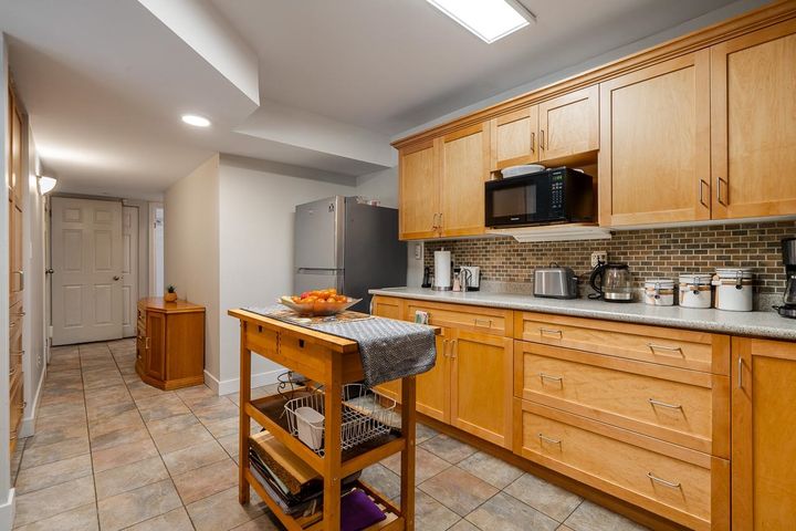 Contemporary Kitchen with Updated Design Features at 1184 Riverside Drive, Seymour NV, North Vancouver