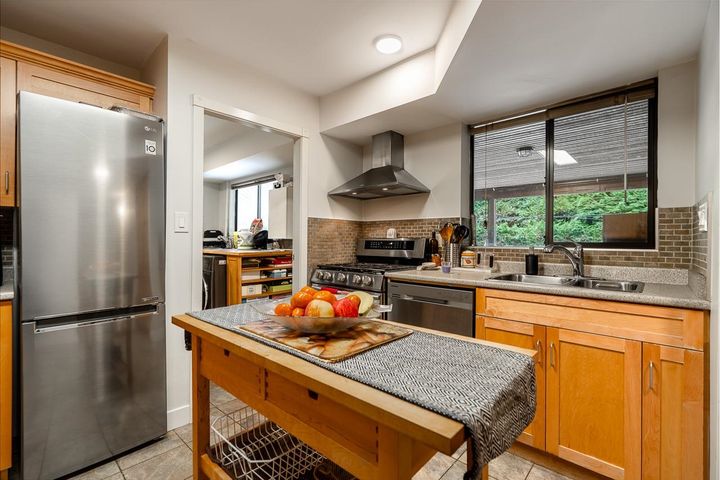 Chef’s Kitchen Designed for Family Meals and Entertaining at 1184 Riverside Drive, Seymour NV, North Vancouver