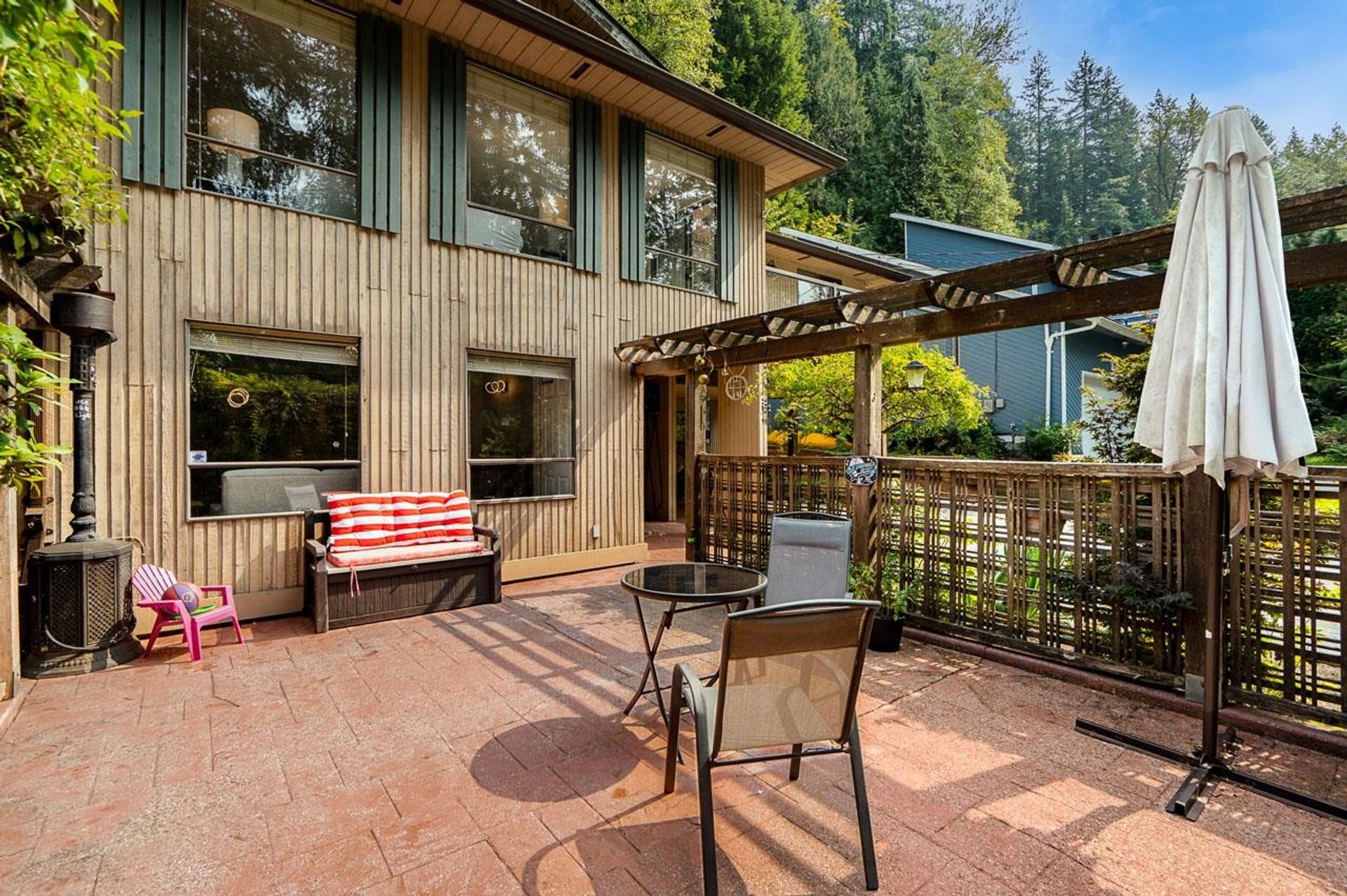 Custom-built home at 1184 Riverside Drive with natural privacy and forest backdrop at 1184 Riverside Drive, Seymour NV, North Vancouver