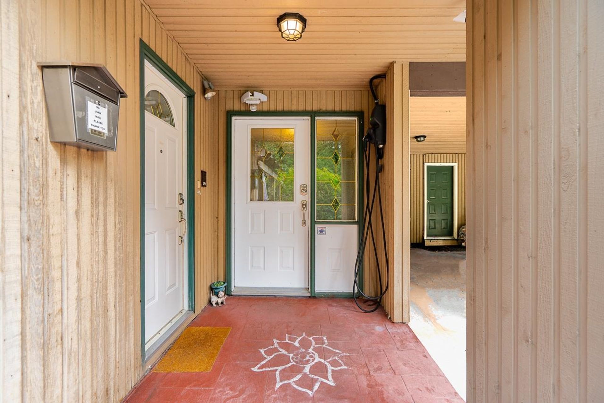 Peaceful North Vancouver home with landscaped front yard on Riverside Drive at 1184 Riverside Drive, Seymour NV, North Vancouver