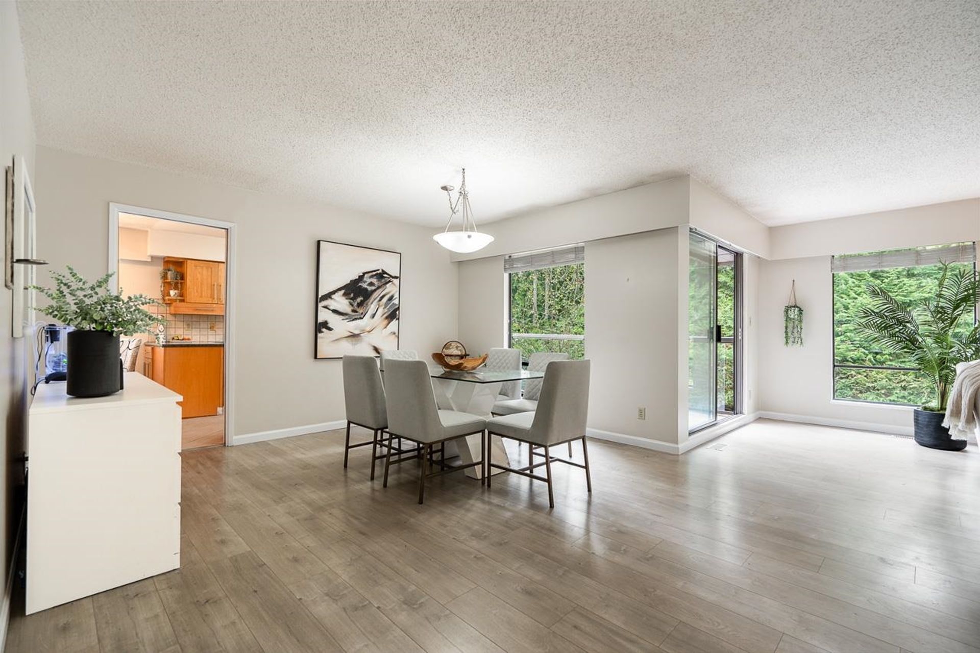 Spacious living area filled with natural light and forest outlooks at 1184 Riverside Drive, Seymour NV, North Vancouver