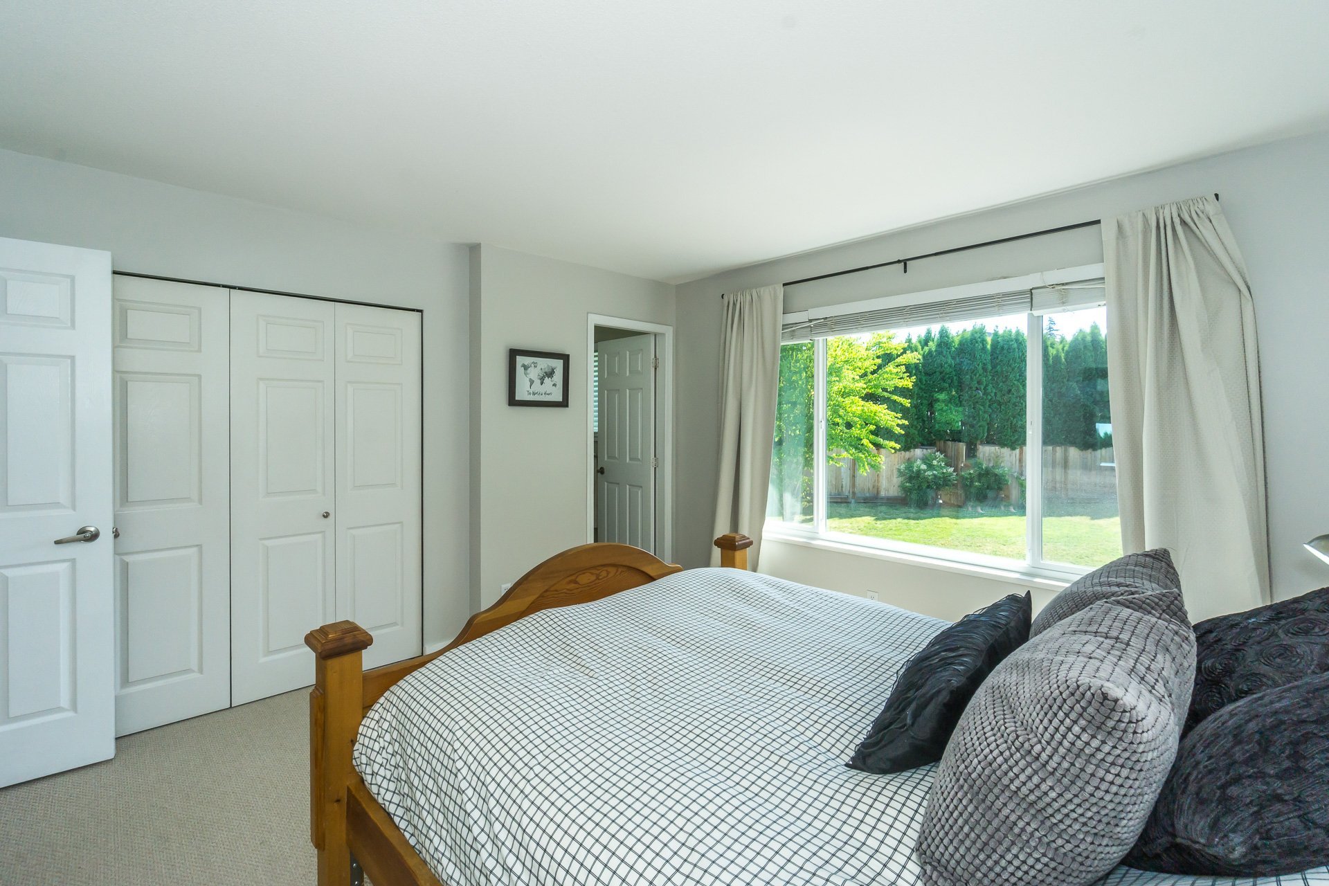 Master Bedroom looking towards Ensuite and Closet (check out the view of the backyard) at 21662 50a Avenue, Murrayville, Langley