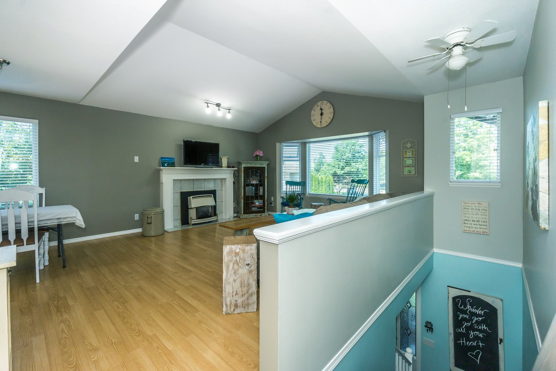 View of Living Room from Stairs at 21662 50a Avenue, Murrayville, Langley