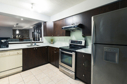 5-kitchen-open-to-dining at 35 - 7533 140 Street, East Newton, Surrey