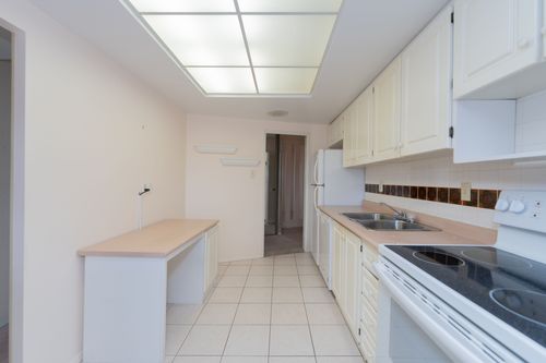 3303-don-mills-rd-1203-print-022-029-kitchen-4200x2800-300dpi at 1203 - 3303 Don Mills, Don Valley Village, Toronto