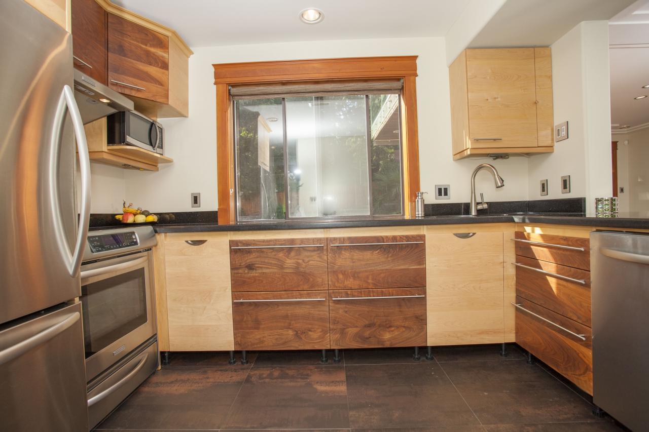 Fully Custom Walnut and Maple Cabinetry in Suite Kitchen
