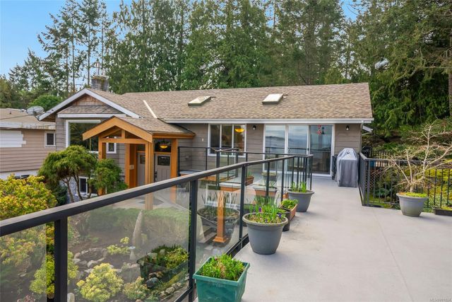 Deck View towards House at 1567 Haida Way, Nanoose, Parksville/Qualicum