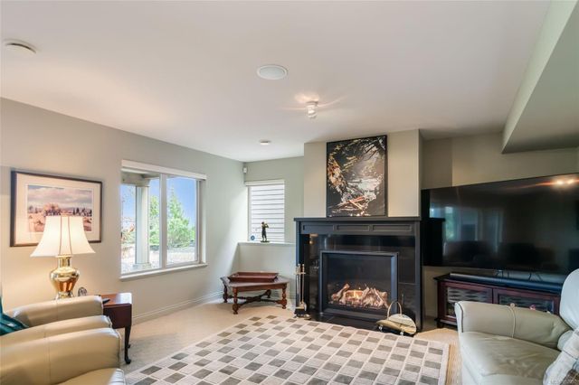 Fireplace/TV Area at 3554 Goodrich Road, Fairwinds, Parksville/Qualicum Fireplace/TV Area at 3554 Goodrich Road, Fairwinds, Parksville/Qualicum