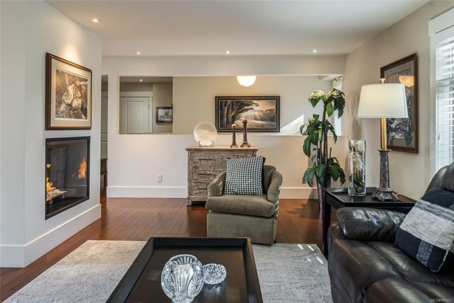 Sitting Area with Fireplace at 997 Dickinson Way, French Creek, Parksville/Qualicum