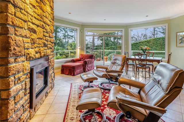 Sitting Area with Fireplace at 3595 Elginwood Place, Fairwinds, Parksville/Qualicum