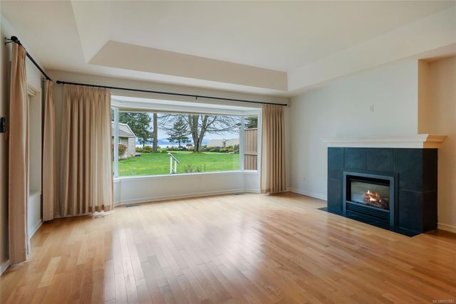 Oceanview Living Area with Fireplace at 21 - 529 Johnstone Road, French Creek, Parksville/Qualicum Oceanview Living Area with Fireplace at 21 - 529 Johnstone Road, French Creek, Parksville/Qualicum