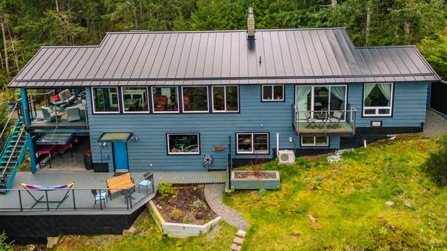 Rear Exterior View at 2311 Mate Place, Nanoose, Parksville/Qualicum Rear Exterior View at 2311 Mate Place, Nanoose, Parksville/Qualicum