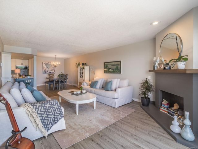 Living Area and Fireplace at 404 - 3555 Outrigger Road, Nanoose, Parksville/Qualicum Living Area and Fireplace at 404 - 3555 Outrigger Road, Nanoose, Parksville/Qualicum