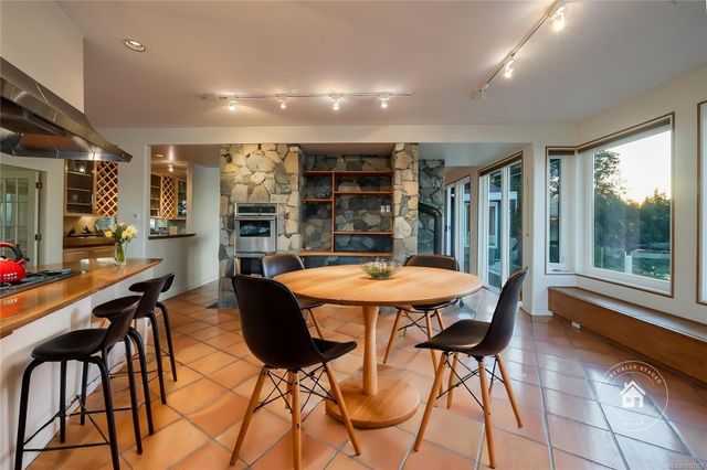 Kitchen Bench and Eating Area at 1555 Seacrest Road, Nanoose, Parksville/Qualicum Kitchen Bench and Eating Area at 1555 Seacrest Road, Nanoose, Parksville/Qualicum