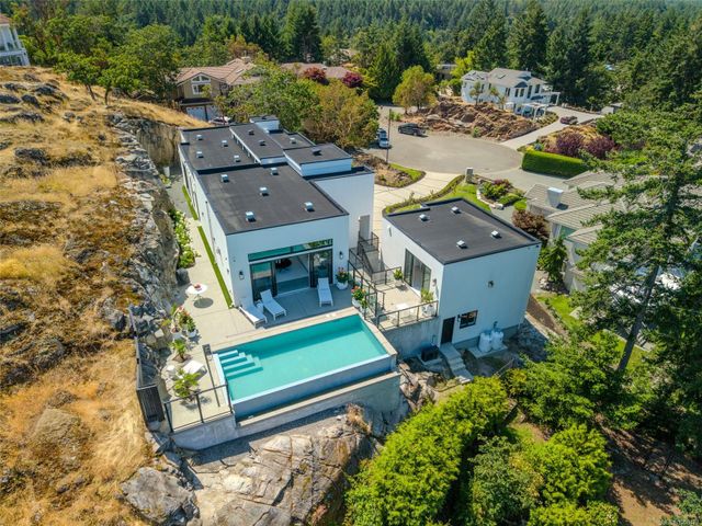 Aerial View of Home and Pool at 2080 Rolston Place, Nanoose, Parksville/Qualicum Aerial View of Home and Pool at 2080 Rolston Place, Nanoose, Parksville/Qualicum