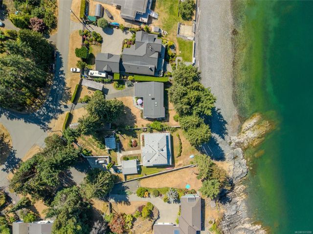 Aerial View of House and Ocean at 1558 Haida Way, Nanoose, Parksville/Qualicum