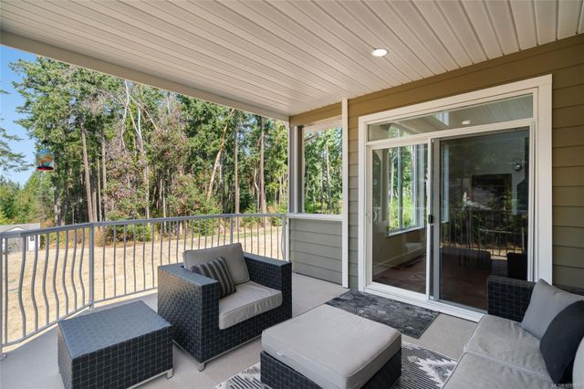 Covered Outdoor Lounge Area at 1075 Cinnamon Sedge Way, Nanoose, Parksville/Qualicum Covered Outdoor Lounge Area at 1075 Cinnamon Sedge Way, Nanoose, Parksville/Qualicum
