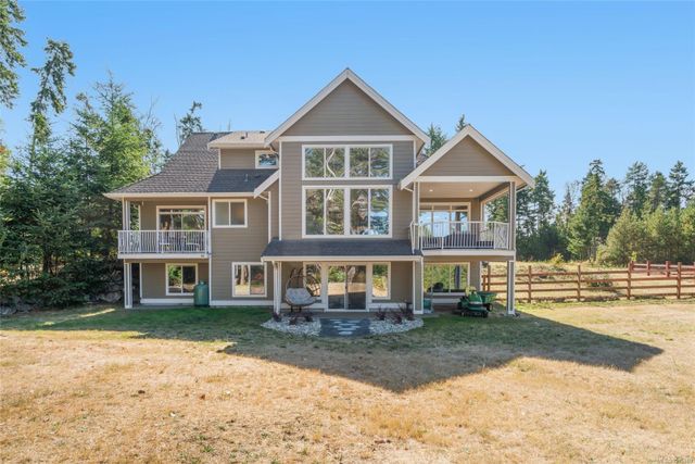 Rear Elevation at 1075 Cinnamon Sedge Way, Nanoose, Parksville/Qualicum Rear Elevation at 1075 Cinnamon Sedge Way, Nanoose, Parksville/Qualicum