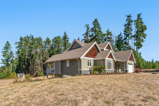 Side view with Woods Behind at 1075 Cinnamon Sedge Way, Nanoose, Parksville/Qualicum Side view with Woods Behind at 1075 Cinnamon Sedge Way, Nanoose, Parksville/Qualicum