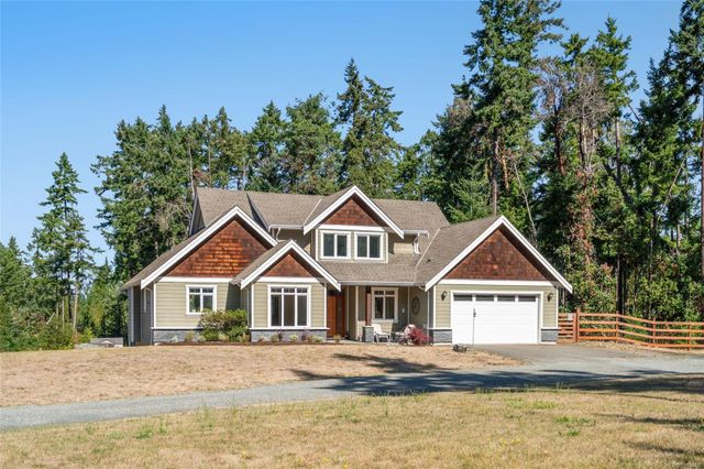 House Front View with Woods Behind at 1075 Cinnamon Sedge Way, Nanoose, Parksville/Qualicum House Front View with Woods Behind at 1075 Cinnamon Sedge Way, Nanoose, Parksville/Qualicum