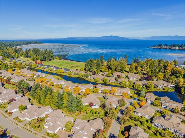 Aerial View towards Ocean at 1358 Saturna Drive, Craig Bay (Parksville), Parksville/Qualicum