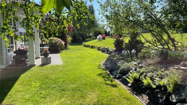 Garden view with Covered Outdoor Area at 1358 Saturna Drive, Craig Bay (Parksville), Parksville/Qualicum