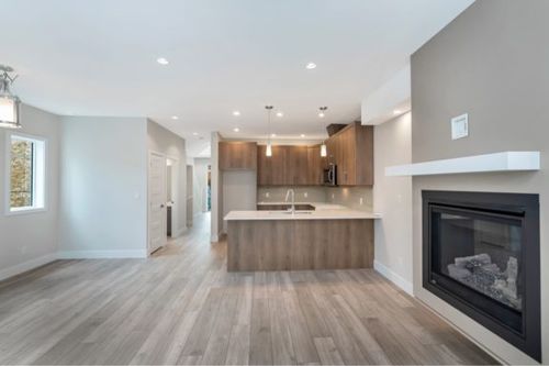 Attached Block C Floorplan, Kitchen and Fireplace Feature at 953 Echo Valley Place, Bear Mountain, Langford